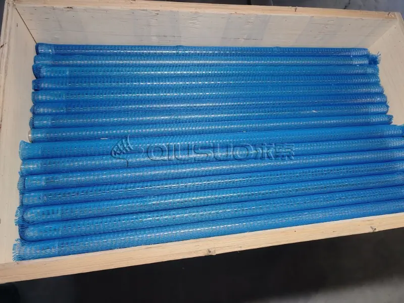 Several wedge wire screen tubes are packed with plastic net sleeves and wooden cases.