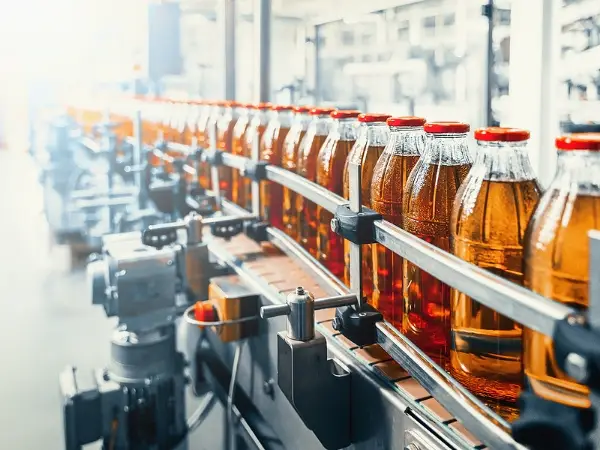 Assembly line in a beverage processing plant