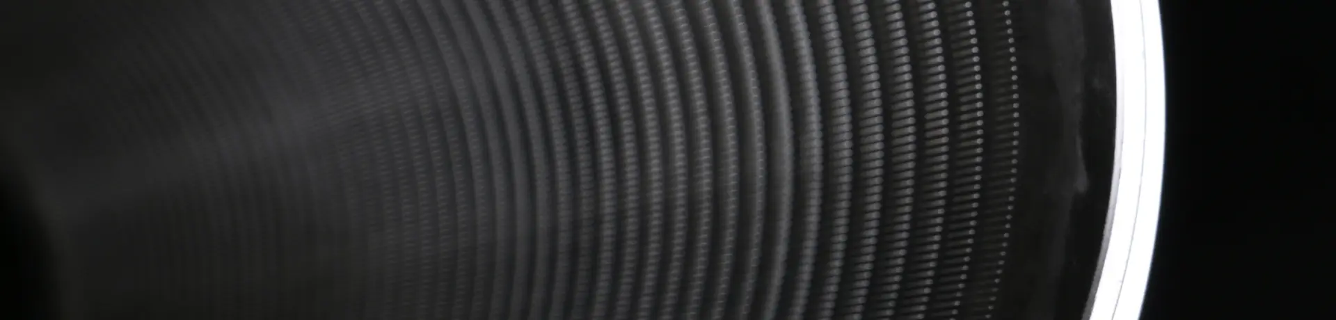 A wedge wire cylinder with light surface and precise dimension.